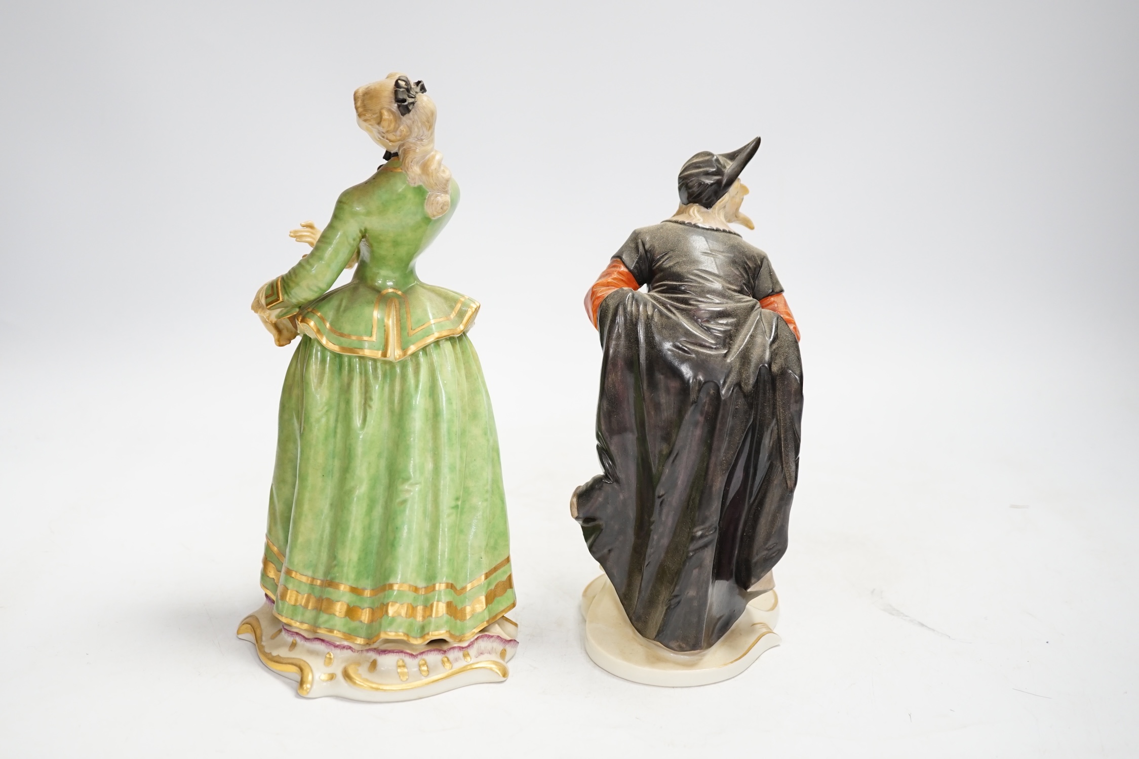 Two Nymphenburg Commedia dell Arte figures, modelled by Bustelli, tallest 21cm high. Condition - loss to bow on her head, very grubby otherwise good condition